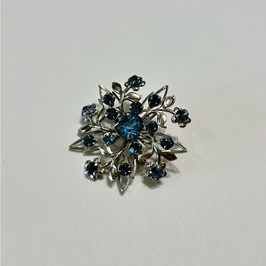 Elegant Silver and Blue Floral Brooch